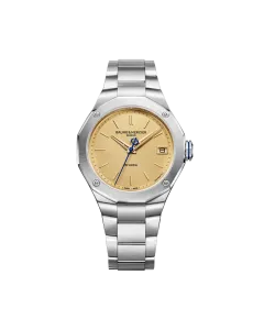 Baume & Mercier RIviera  med Baumatic-verk til herre på 39 mm. Gul skive, kasse og lenke i stål. 100 meter vanntett.