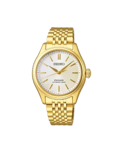 Seiko Presage Classic SPB524J1 er en unisexklokke på 36 mm i gullfarget stål med lys skive. 