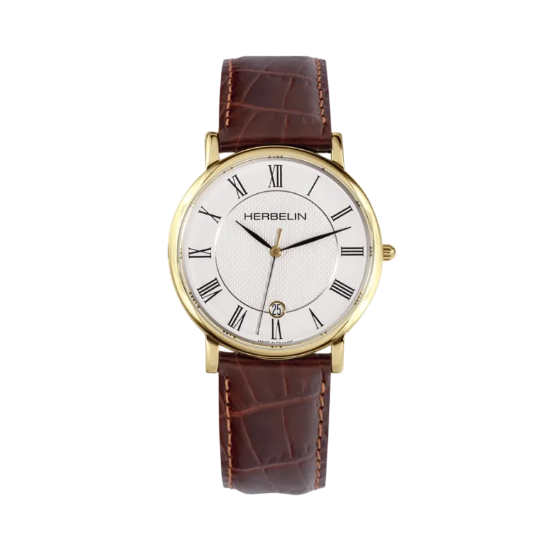 Herbelin Classique dameur med hvit skive med romertall, gullfarget kasse, brun skinnrem og quartzverk. Herbelin Classique dameur med hvit skive med romertall, gullfarget kasse, brun skinnrem og quartzverk.