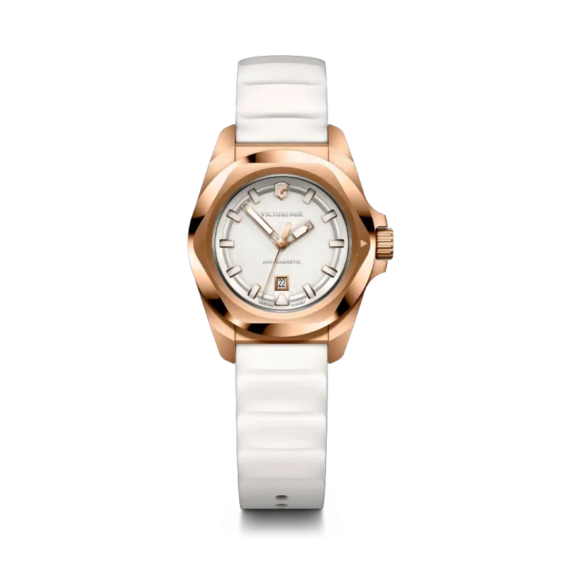 Victorinox I.N.O.X. Small dameklokke med rosegullfarget kasse, hvit tallskive og hvit gummirem.